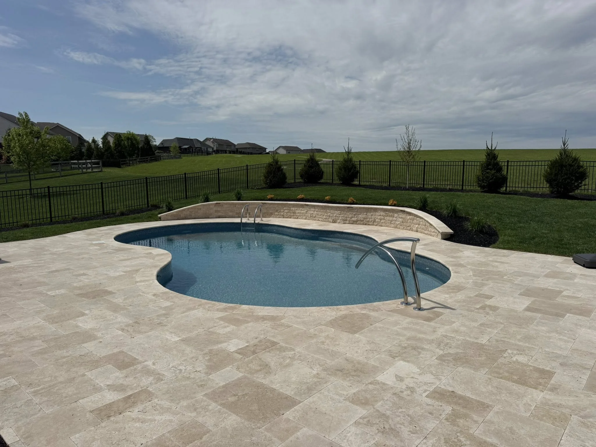 Custom inground pool installation by Aquascapes Pools & Excavating in Southwest Ohio